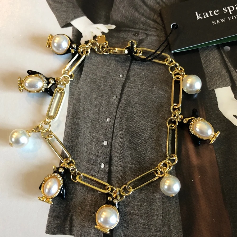 Authentic kate spade NWT Gold Charm Bracelet with Pearls and Black Penguins